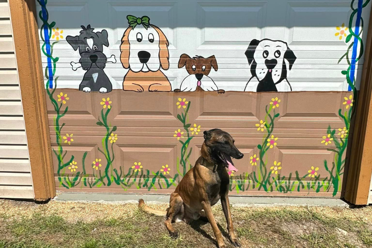 Untitled design – 2023-08-16T181300.832 Dog smiling outside facility